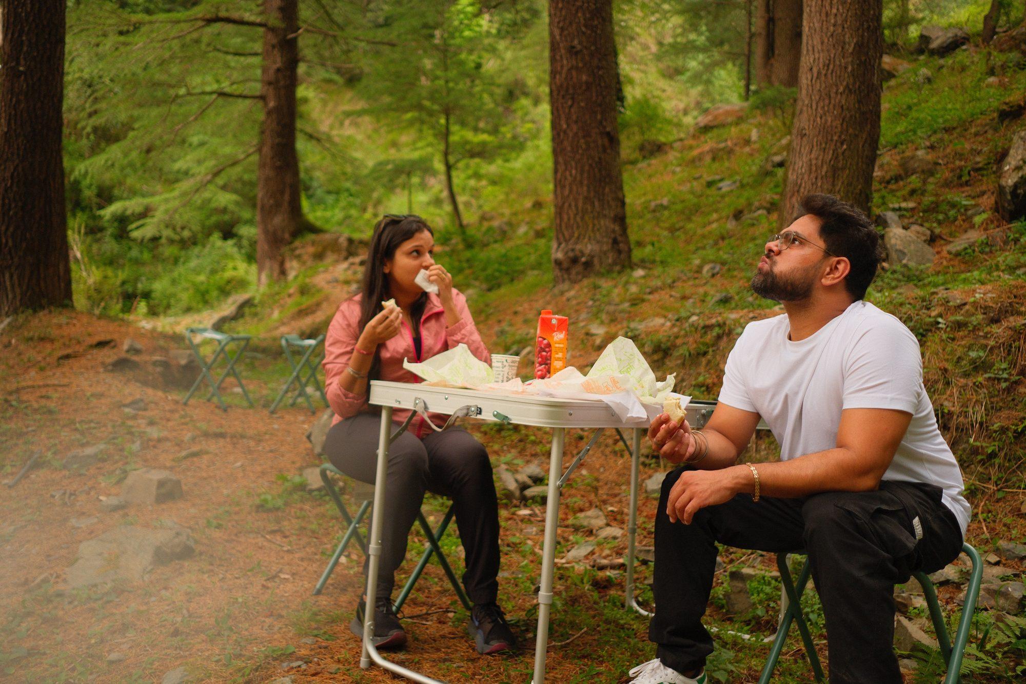 A roadside table set among the deodars