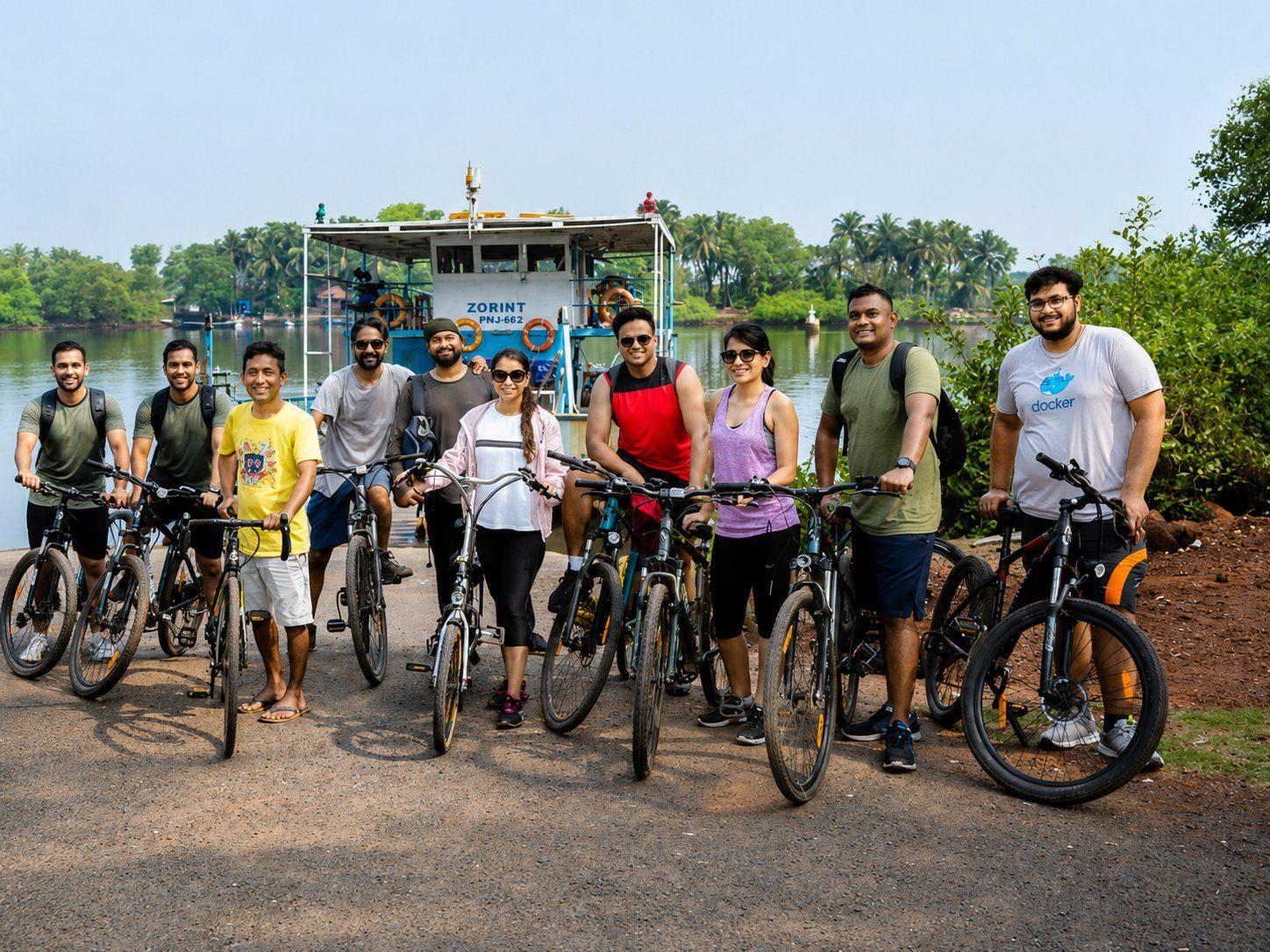 The group with their bikes at the river ferry jetty