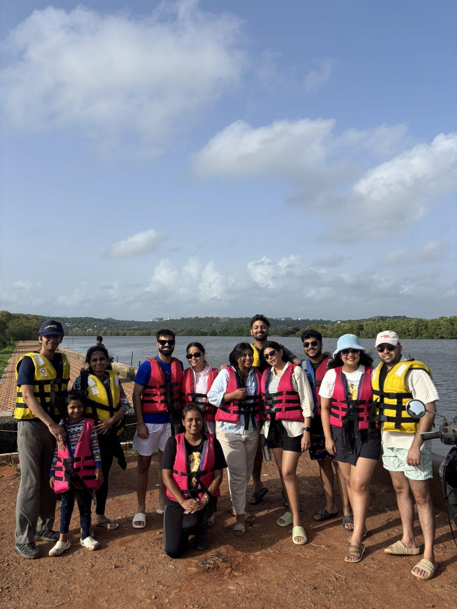 The group in life jackets on the launch bank
