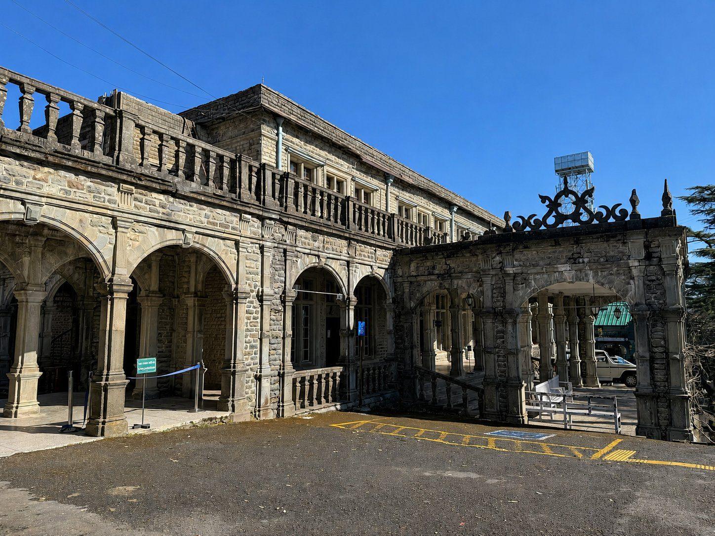 The arcaded stone frontage and forecourt