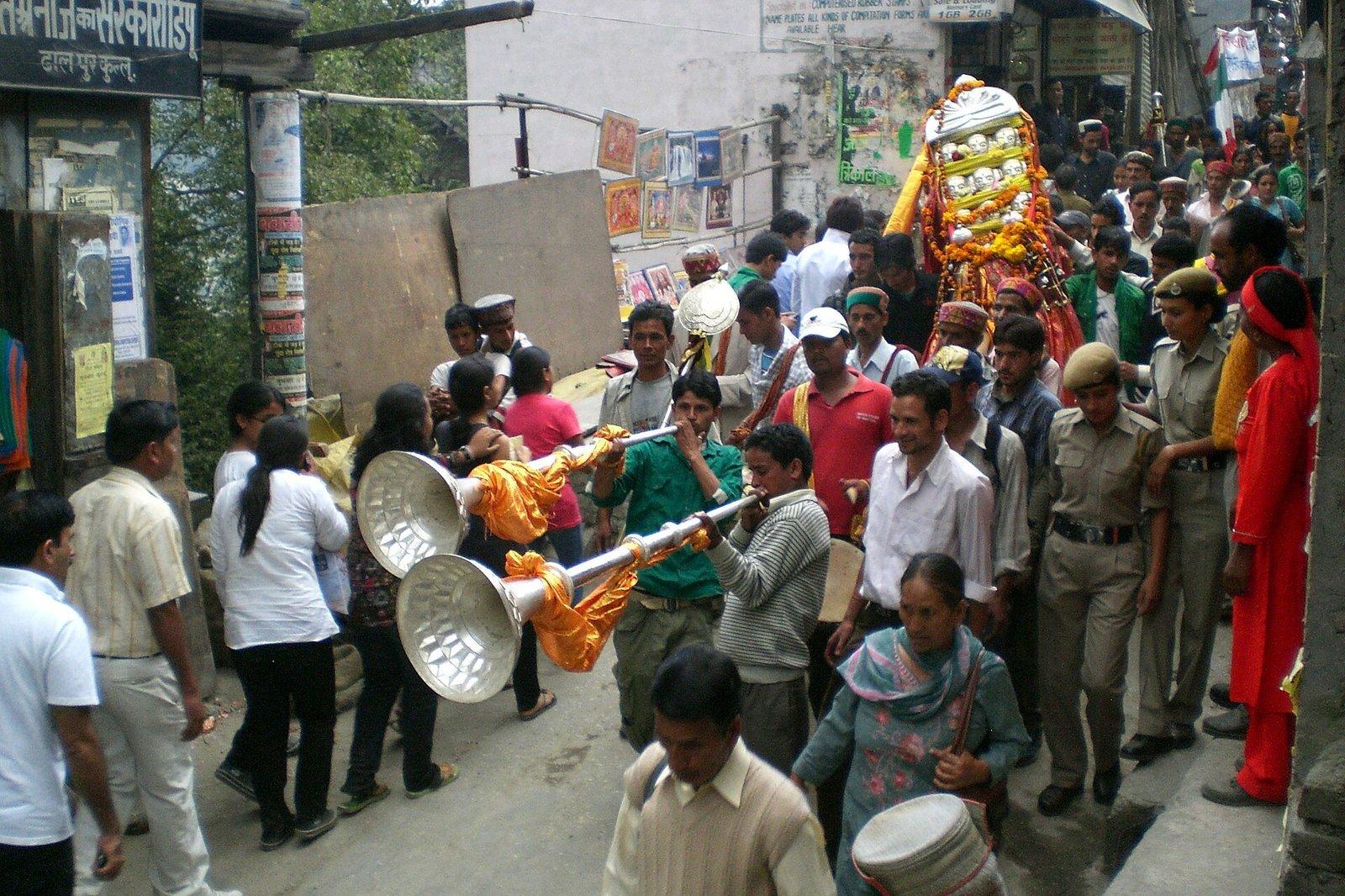 Deity procession with traditional musicians during Kullu Dussehra festival in Himachal Pradesh