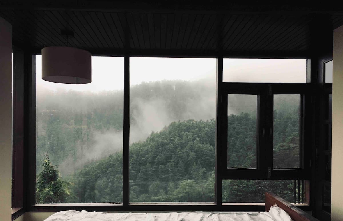 Bedroom with Misty Mountain View