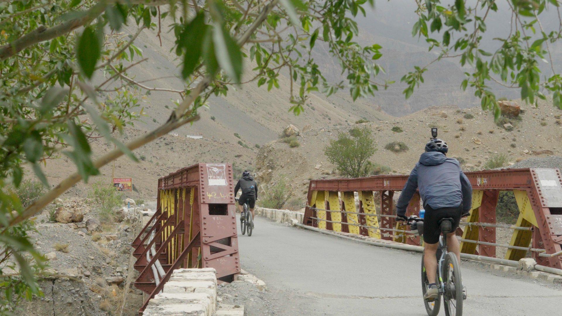 Cyclists on the Great Himalayan Bikepacking Trail in the high Himalaya