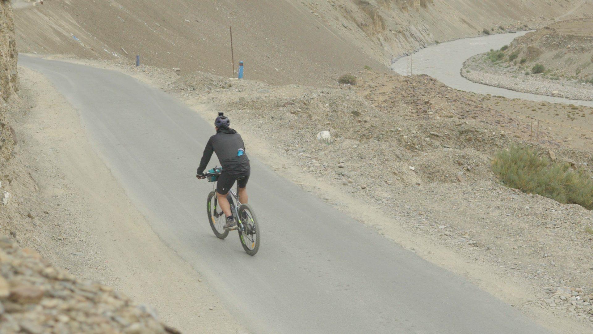 Cyclists on the Great Himalayan Bikepacking Trail in the high Himalaya