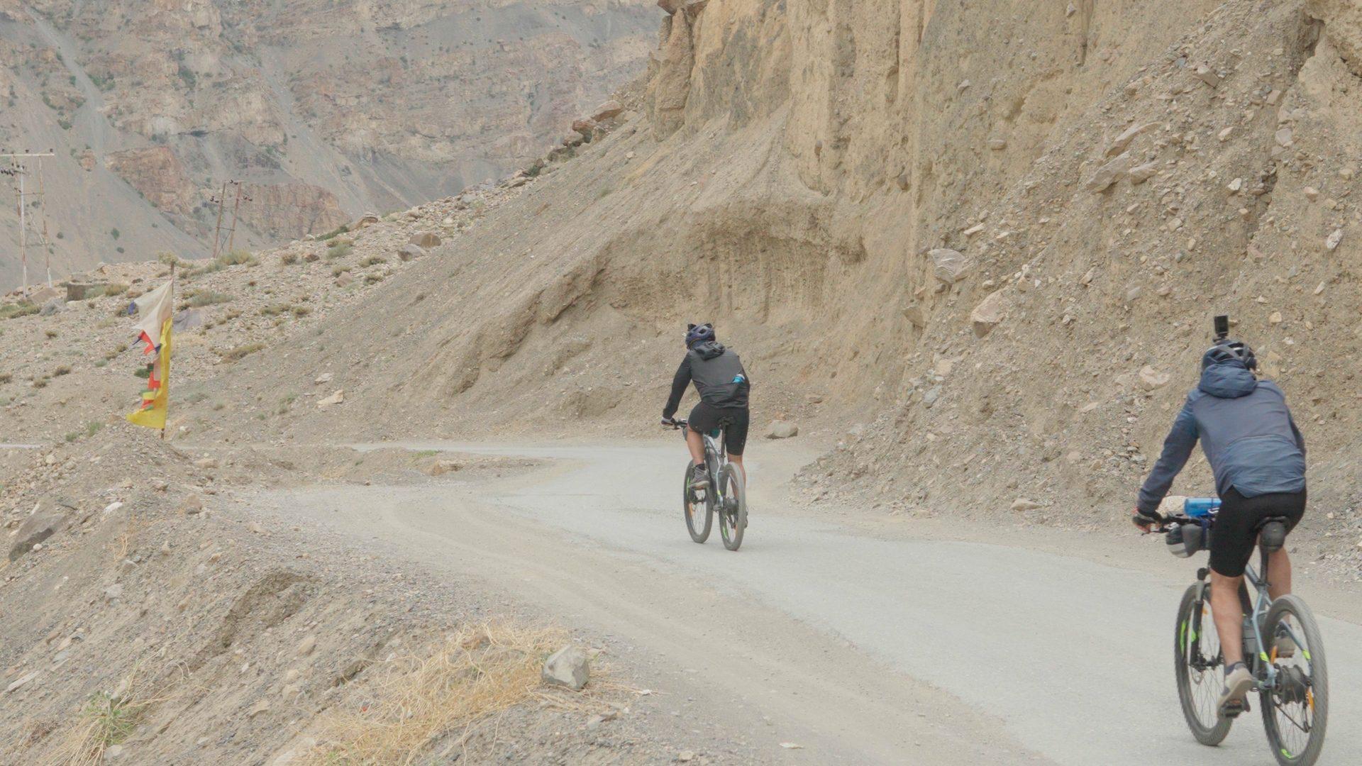 Cyclists on the Great Himalayan Bikepacking Trail in the high Himalaya