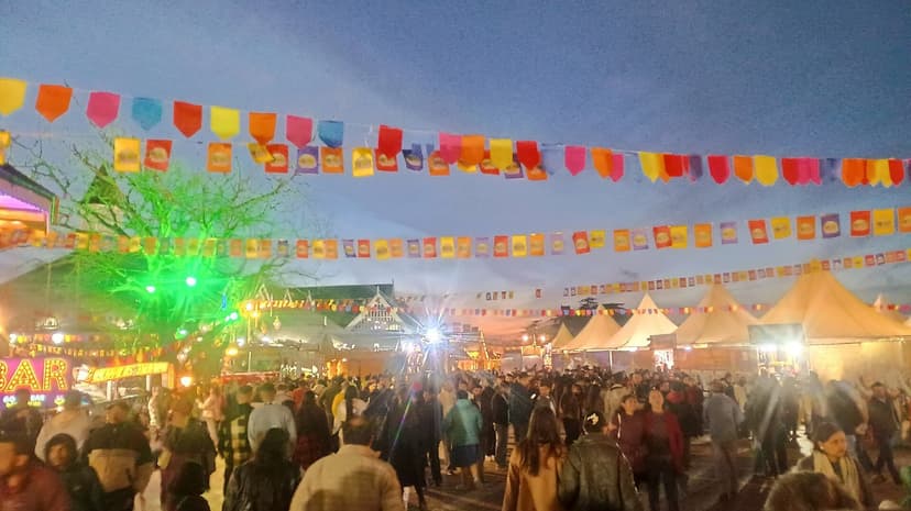 Shimla Winter Carnival 2025 on The Ridge, lit with colourful bunting at dusk, with no snow visible on the ground