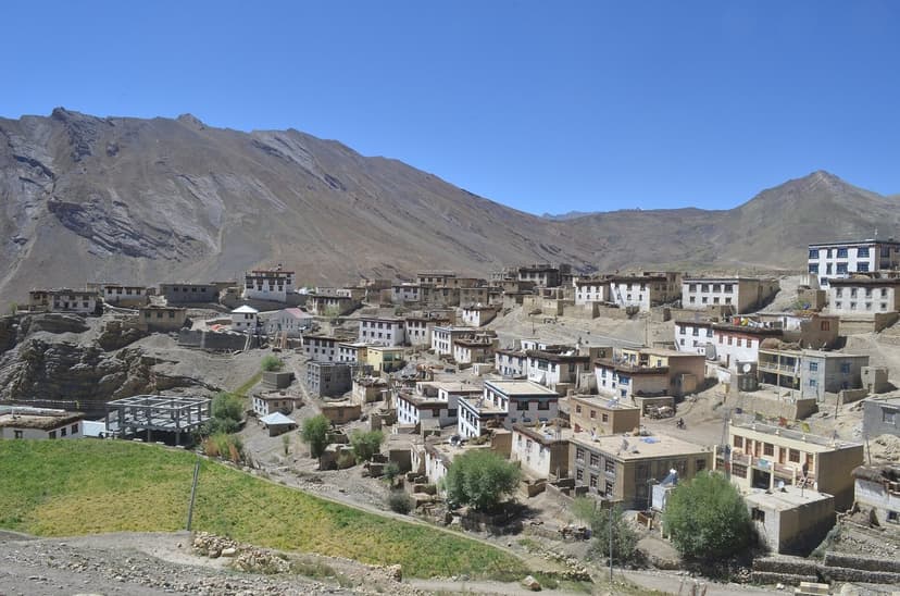 The whitewashed houses of Kibber village on a brown Spiti hillside at about 4,270 m