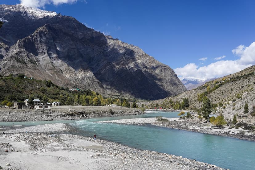 Two turquoise rivers merging in an arid Lahaul mountain valley at Tandi, where the Chandra and Bhaga rivers become the Chenab