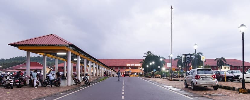 Covered entrance and approach road to Madgaon railway station in South Goa at dusk