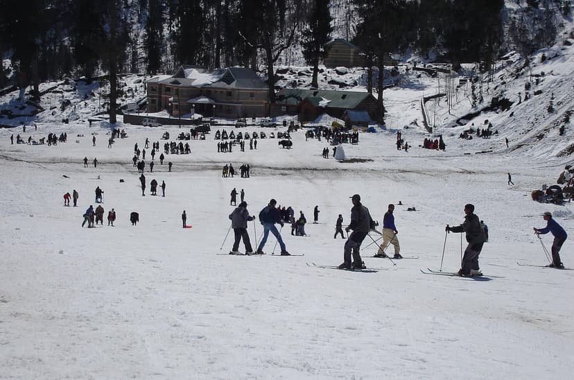 Skiers and day visitors crowding the snow slopes near Manali in winter
