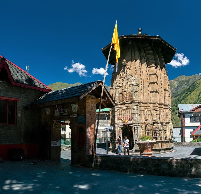 Narasimha Temple at Bharmour, wider view of carved stone shikhara among Chaurasi cluster buildings