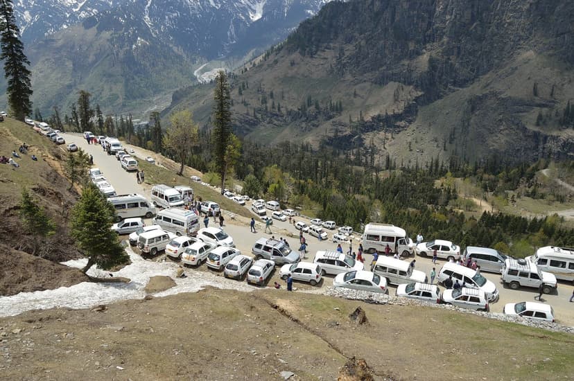 Dozens of white tourist taxis jammed along the Gulaba-Rohtang mountain road in peak season