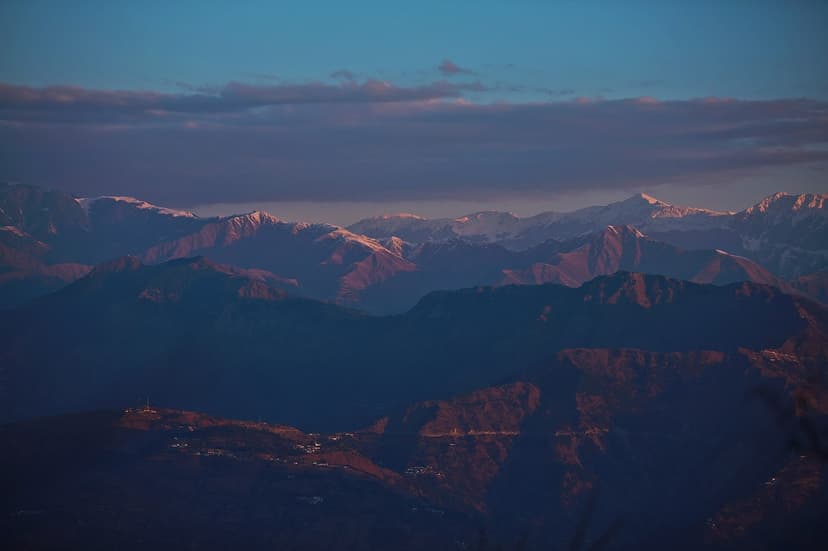 Snow-capped Pir Panjal range catching alpenglow at sunset, seen from Dalhousie