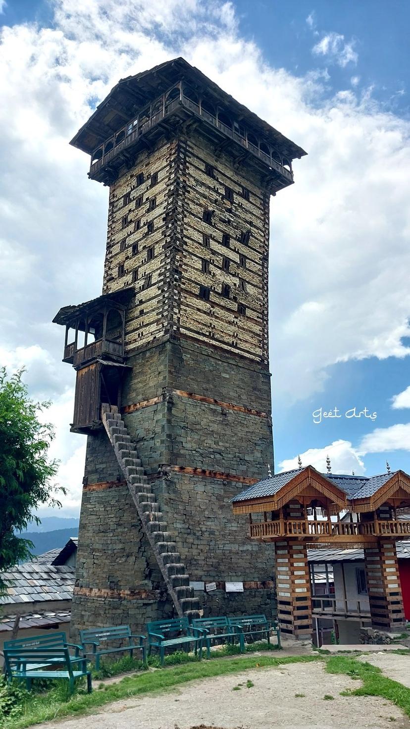 Chehni Kothi in Tirthan Valley — a multi-storey kath-kuni tower built of stone and wood without nails or mortar, one of the tallest surviving traditional structures in the Himalayas